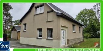 Entwicklungspotenzial im Grünen – Großes Grundstück mit Einfamilienhaus zwischen Langebrück & Klotzsche Haus kaufen 01465 Langebrück Bild mittel