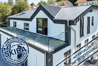 Erstbezug: Moderne Neubau-Erdgeschoss-Eigentumswohnung mit 2 Garagen in Daun-Pützborn Wohnung kaufen 54550 Daun Bild mittel