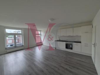Exklusives Wohnen im historischen Schulgebäude - 2-Zimmer-Wohnung mit Stil und Geschichte Wohnung mieten 26382 Wilhelmshaven Bild mittel