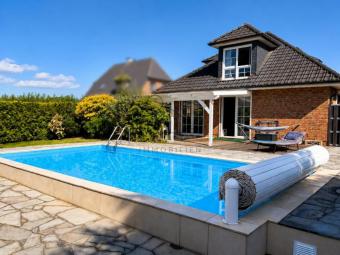 Familientraum mit eigenem Pool und Weitblick - Modernes Wohnen in ruhiger Lage Haus kaufen 25335 Bokholt-Hanredder Bild mittel