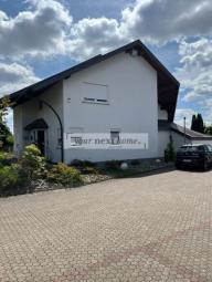 Freistehendes Einfamilienhaus im Mischgebiet – Wohnen mit vielseitigen Nutzungsmöglichkeiten! Haus kaufen 66450 Bexbach Bild mittel