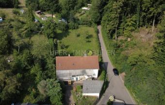 Freistehendes Einfamilienhaus mit großem Garten in ruhiger Waldrandlage Haus kaufen 76857 Gossersweiler-Stein Bild mittel