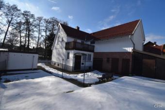 Freistehendes Einfamilienhaus mit kleinem Nebengelass, Garage und ebenerdigen Grundstück Haus kaufen 37445 Walkenried Bild mittel