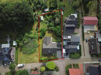 Freistehendes Wohnhaus mit großzügigem Garten und Ausbaureserve. Haus kaufen 49843 Uelsen Bild mittel