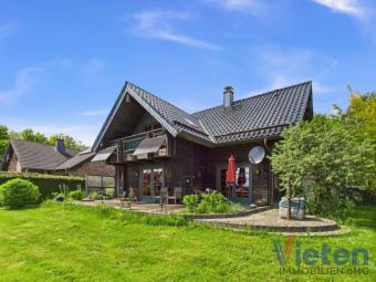 Gemütliches Holzblockhaus mit Erdwärmepumpe, Sauna und idyllischem Garten in Ortsrandlage Haus kaufen 53947 Nettersheim Bild mittel