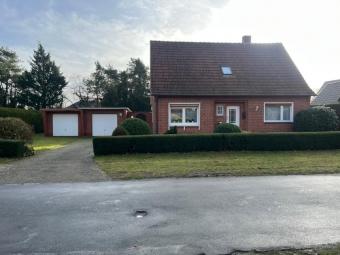 **Gepflegtes Einfamilienhaus mit großem Grundstück und solider Bauweise Grundstück & 2 Garagen** Haus kaufen 26904 Börger Bild mittel