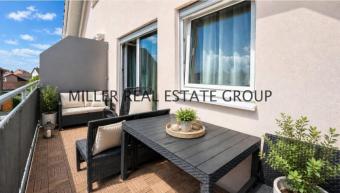 Großzügige 5-Zimmer-Maisonette-Wohnung mit Balkon und zwei Stellplätzen in gefragter Lage von Kösching bei Ingolstadt Wohnung kaufen 85092 Kösching Bild mittel