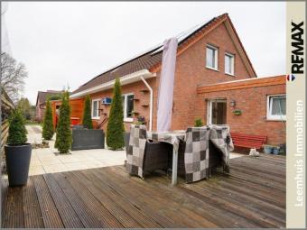 Großzügiges Familienhaus in Toplage von Bunde! 
Mit PV-Anlage, Loggia, Garage & sonniger Terrasse Haus kaufen 26831 Bunde Bild mittel