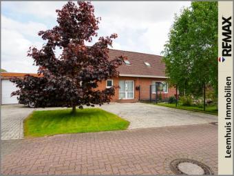 Großzügiges Familienhaus in Toplage von Bunde! 
Mit PV-Anlage, Loggia, Garage & sonniger Terrasse Haus kaufen 26831 Bunde Bild mittel