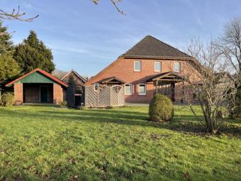 Gulfhof mit 2 Wohnungen, Einbauküchen, Garage, Werkstatt etc. in ruhiger Lage! Haus kaufen 26556 Schweindorf Bild mittel