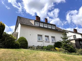 Gut geschnittenes Zweifamilienhaus mit Traumgarten und Garage Haus kaufen 32694 Dörentrup Bild mittel