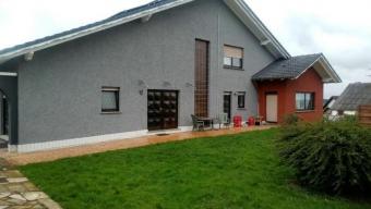 Heddert - Mehrfamilienhaus mit 6 Wohneinheiten auf großem Grundstück und Wintergarten Haus kaufen 54429 Heddert Bild mittel