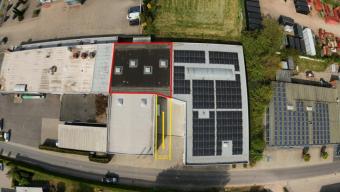 Helle Stahlrahmen-Halle mit elektrischem Sektionaltor und großer Hofzufahrt – Industriegebiet Uelsen Gewerbe mieten 49843 Uelsen Bild mittel
