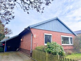 Ihr Haus in Lohe-Rickelshof: ebenerdiger Satteldach-Bungalow mit Einliegerwhg. in ruhiger Lage Haus kaufen 25746 Lohe-Rickelshof Bild mittel