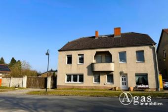 Kapitalanlage - Vermieteter Vierseitenhof mit 8 Wohneinheiten, Garagen und großer Grünfläche Haus kaufen 14621 Schönwalde-Glien Bild mittel