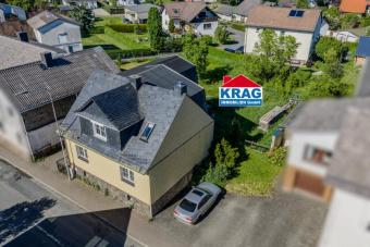 ++ KRAG Immobilien ++ Zwei Wohneinheiten, ca. 142 m² Wohnfläche, Garten und Garage ++ Haus kaufen 35080 Bad Endbach Bild mittel