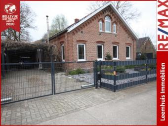 *Ländliche Lage * 6 Zimmer * saniert * gepflegter & großzügiger Garten * Kamin * Carport * Terrasse* Haus kaufen 26826 Weener Bild mittel
