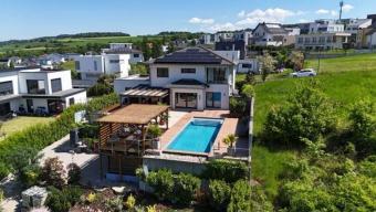 Luxusvilla mit Infinity-Pool & unverbaubarem Moselblick bis nach Luxemburg Haus kaufen 54457 Wincheringen Bild mittel