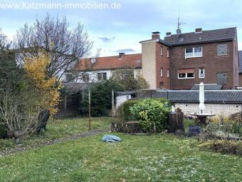 Mehrfamilienhaus + Garagen + 747 m² großes Grundstück zu verkaufen Haus kaufen 50354 Hürth Bild mittel