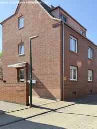 Mehrfamilienhaus + Garagen + 747 m² großes Grundstück zu verkaufen Haus kaufen 50354 Hürth Bild mittel