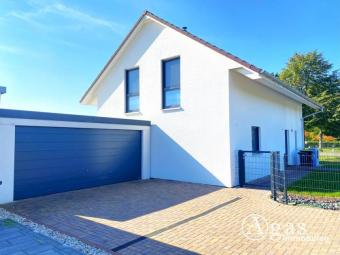 Modernes Einfamilienhaus mit Garage und großem Garten in Seenähe Haus kaufen 04509 Löbnitz (Landkreis Nordsachsen) Bild mittel