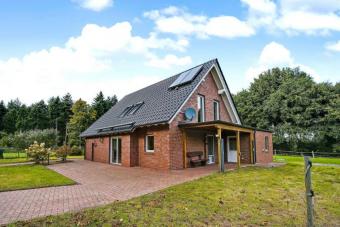 Modernes Landhaus von 2014 mit Doppelgarage + über 18.000 m² Grundstück – ideal für Pferdeliebhaber Haus kaufen 49497 Mettingen Bild mittel