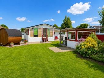 Möbliertes Ferienhaus mit Boot und Fass-Sauna am Wasser! Haus kaufen 26624 Südbrookmerland Bild mittel