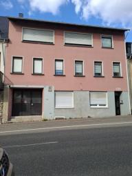 - PROVISIONSFREI -
Wohnhaus mit 4 Wohnungen und Lager - fest vermietet - Haus kaufen 66386 St. Ingbert Bild mittel