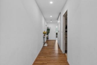Schöne Aussichten: 4- Zimmer Wohnung mit großem Balkon, Stellplatz und EBK Wohnung kaufen 76549 Hügelsheim Bild mittel