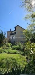 Schönes Zweifamilienhaus für Kapitalanleger oder Mehrgenerationshaus Haus kaufen 54320 Waldrach Bild mittel