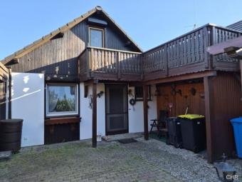 Sehr gepflegtes kleines Einfamilienhaus (Reihenmittelhaus) mit Garten und Balkon Haus kaufen 37445 Walkenried Bild mittel