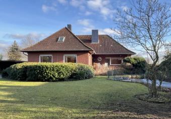 ***Solider Winkelbungalow mit viel Platz in ruhiger Feldrandlage*** Haus kaufen 31535 Neustadt am Rübenberge Bild mittel