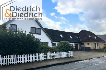 Verkauf eines vermieteten Zweifamilien- und eines Einfamilienhauses in gefragter Wohnlage in Heide-Ost Haus kaufen 25746 Heide Bild mittel