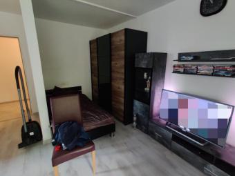 Vermietete zentrale 1-Zimmer-Wohnung 
mit Tiefgaragenstellplatz in Gütersloh Wohnung kaufen 33332 Gütersloh Bild mittel