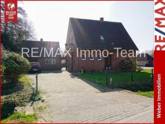 Viel Platz zum Wohlfühlen: Einfamilienhaus mit großem Garten & Potenzial in Backemoor! Haus kaufen 26817 Rhauderfehn Bild mittel