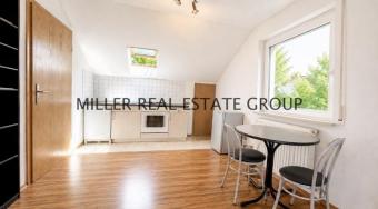 Wertstabile Kapitalanlage in Ingolstadt-Friedrichshofen: Vermietetes Dachgeschoss-Apartment mit Tiefgaragenstellplatz in ruhiger zweiter Reihe! Wohnung kaufen 85049 Ingolstadt Bild mittel