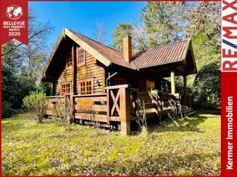 Wochenendhaus / Rundbohlenblockhaus /
Am See / Waldlage /
Erholung Pur Haus kaufen 26215 Wiefelstede Bild mittel