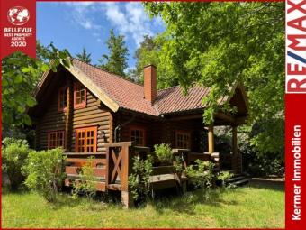 Wochenendhaus / Rundbohlenblockhaus /
Am See / Waldlage /
Erholung Pur Haus kaufen 26215 Wiefelstede Bild mittel