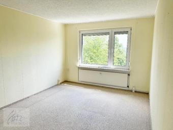 ***WOHNUNG & GARAGE - IHR NEUES PROJEKT MIT WEITBLICK*** Gemütliche Eigentumswohnung mit viel Potenzial und eigener Garage Wohnung kaufen 01619 Zeithain Bild mittel