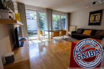 Zentrale Lage in Bonn: Ebenerdige, möblierte Wohnung mit überdachter Terrasse Wohnung mieten 53111 Bonn Bild mittel