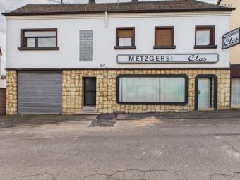 Zweifamilienhaus in Neunkirchen mit großer Gewerbeeinheit – 234 m² Wohnfläche und 718 m² Grundstück! Haus kaufen 66538 Neunkirchen Bild mittel
