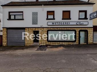 Zweifamilienhaus mit Gewerbeeinheit in zentraler Lage von Neunkirchen – 230 m² Wohnfläche, 8 Zimmer! Haus kaufen 66538 Neunkirchen Bild mittel