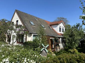 Zweifamilienhaus (vermietet - ca. 6,4 % Rendite) in ruhiger und dennoch zentraler Lage von Langen Haus kaufen 27607 Langen (Landkreis Cuxhaven) Bild mittel
