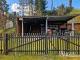 Erholung pur: Freizeitbungalow mit Holzblockhaus in Bungalowsiedlung und Kanalblick Haus kaufen 15295 Groß Lindow Bild thumb