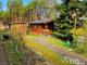 Erholung pur: Freizeitbungalow mit Holzblockhaus in Bungalowsiedlung und Kanalblick Haus kaufen 15295 Groß Lindow Bild thumb