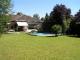 Gepflegter Walmdach-Bungalow mit Pool und Werkstatthaus Haus kaufen 82054 Sauerlach Bild thumb