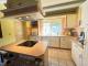 Winkelbungalow mit Schwimmbad, Photovoltaikanlage, EBK und 2 Garagen! Haus kaufen 26524 Hage Bild thumb