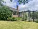 Wohnen auf einer Ebene in Lohe-Rickelshof: Bungalow mit Einliegerwohnung und Wintergarten Haus kaufen 25746 Lohe-Rickelshof Bild thumb